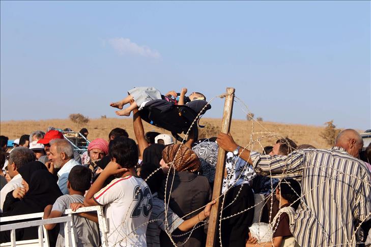 1,073 more Syrians cross in Turkey