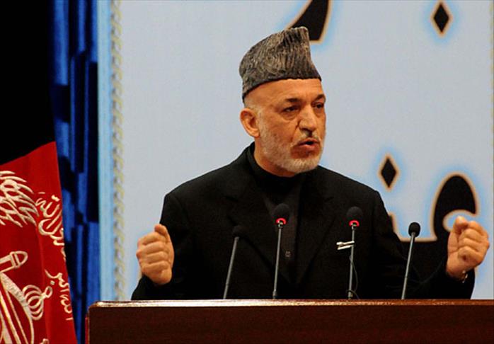 Карзаи призвал талибов сложить оружие