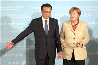 Merkel calls for peaceful solution to HK protests