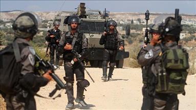Israel rounds up 18 Palestinians in West Bank raids