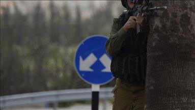 Israeli forces fire grenade at couple holding baby