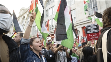 Pro-Palestine protesters gather in front of Israeli Embassy in London
