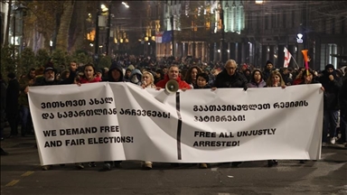 Thousands gather in Georgia's capital to protest decision to suspend EU accession talks
