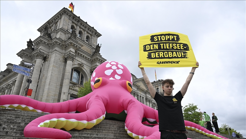 Greenpeace stages protest in Berlin against deep-sea mining with giant octopus