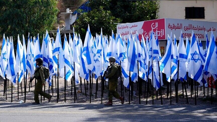 Palestinian body: Raising Israeli flags in the West Bank entrenches settler presence