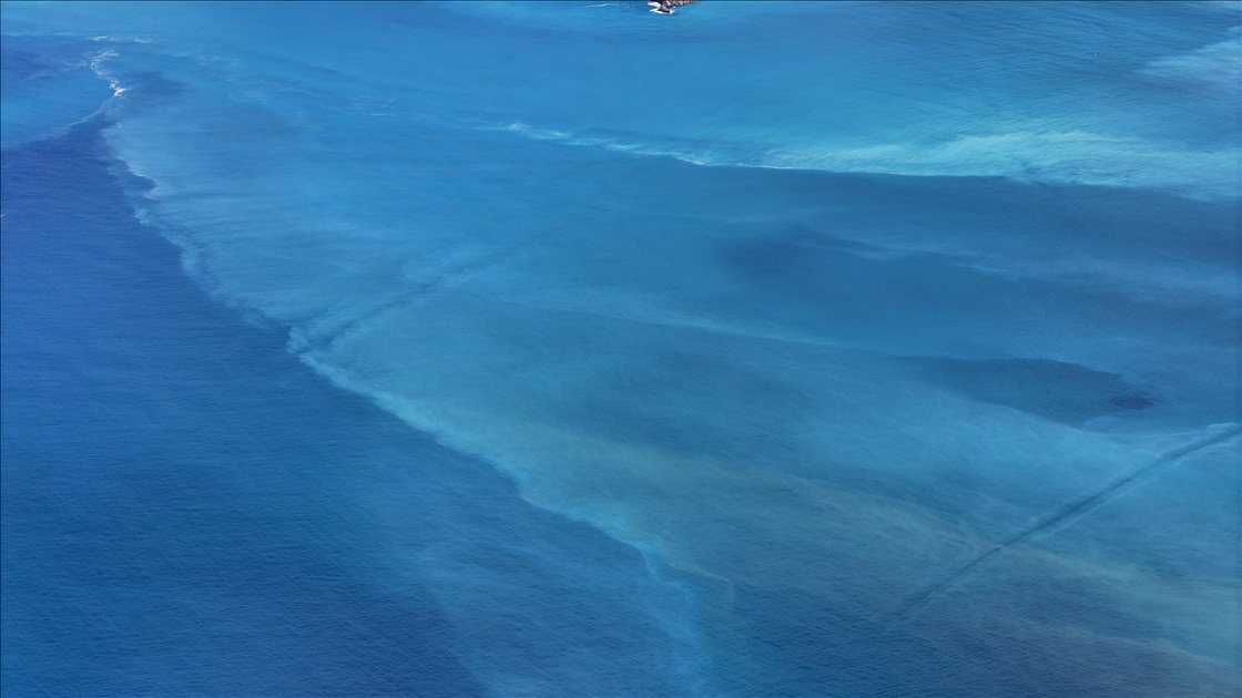 Fethiye'de sağanak sonrası Ölüdeniz turkuaz renge büründü