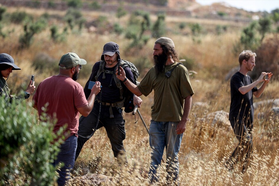 Israeli settlers attack Palestinians, foreign activists in West Bank