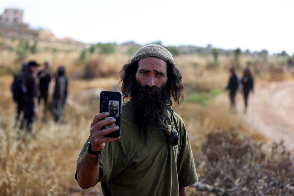 Israeli settlers attack Palestinians, foreign activists in West Bank