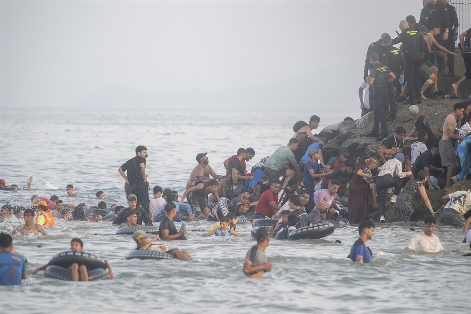 Hundreds of migrants reach Spain's Ceuta after swimming from Morocco