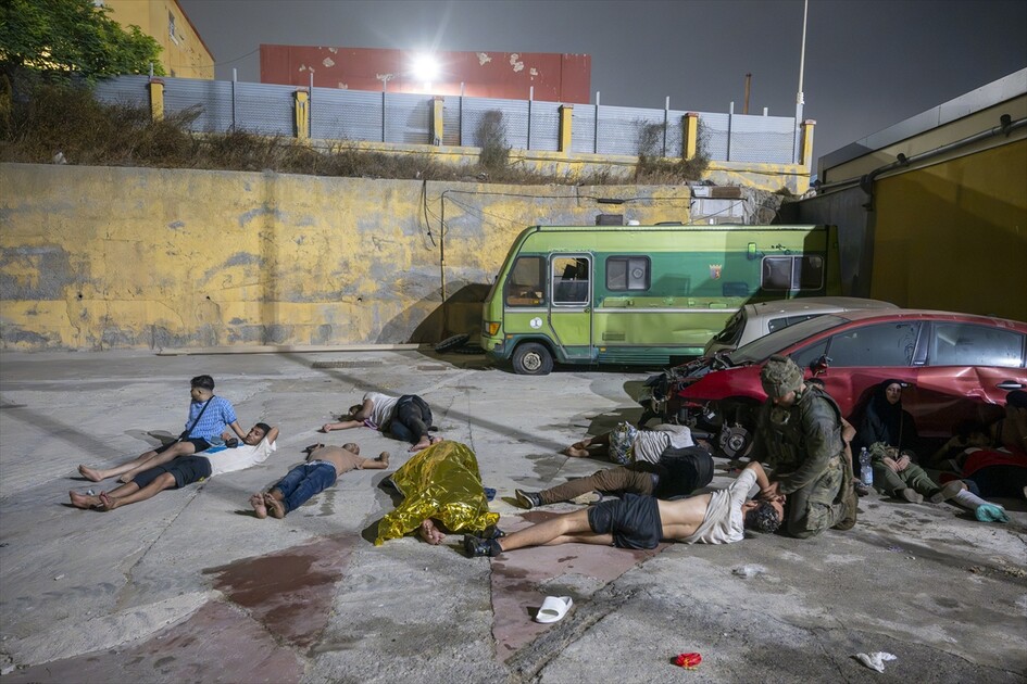 Hundreds of migrants reach Spain's Ceuta after swimming from Morocco