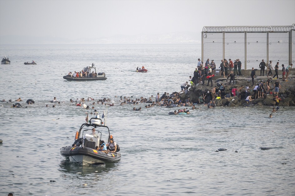 Hundreds of migrants reach Spain's Ceuta after swimming from Morocco