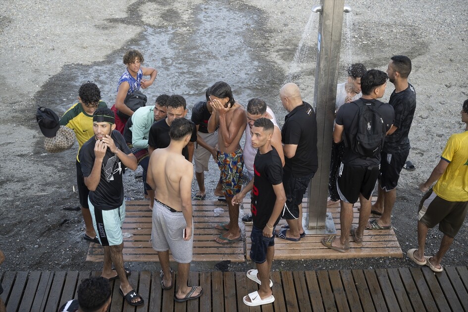 Hundreds of migrants reach Spain's Ceuta after swimming from Morocco