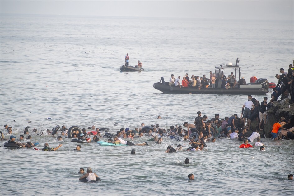 Hundreds of migrants reach Spain's Ceuta after swimming from Morocco