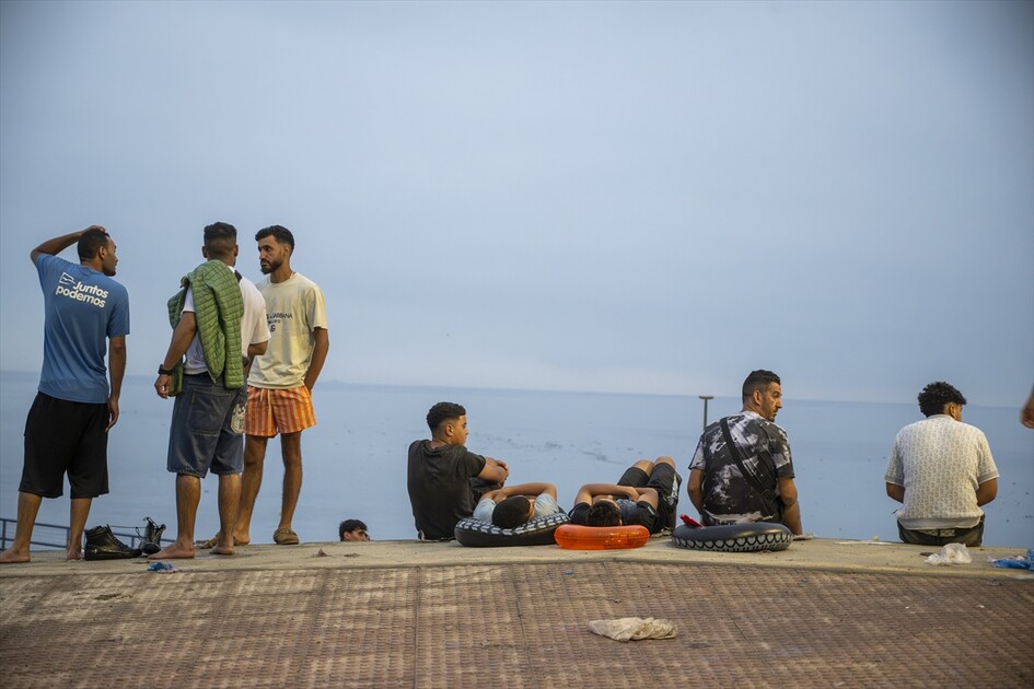 Migrants arrive on shore after attempting sea crossing to Ceuta from Morocco