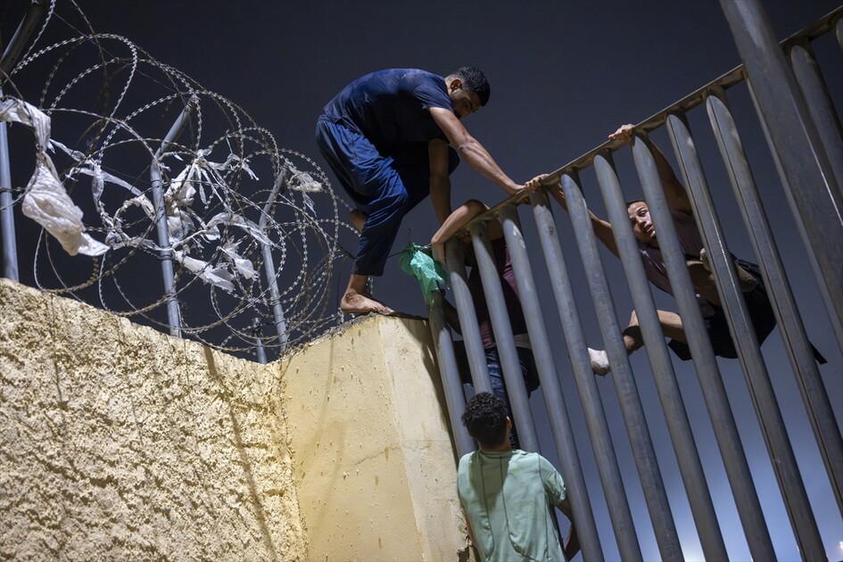 Hundreds of migrants reach Spain's Ceuta after swimming from Morocco