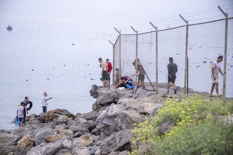 Migrants arrive on shore after attempting sea crossing to Ceuta from Morocco