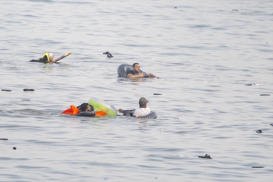 Hundreds of migrants reach Spain's Ceuta after swimming from Morocco