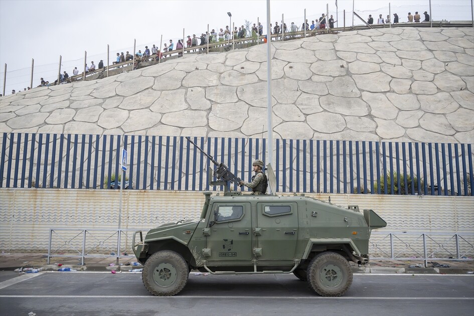 Migrants arrive on shore after attempting sea crossing to Ceuta from Morocco